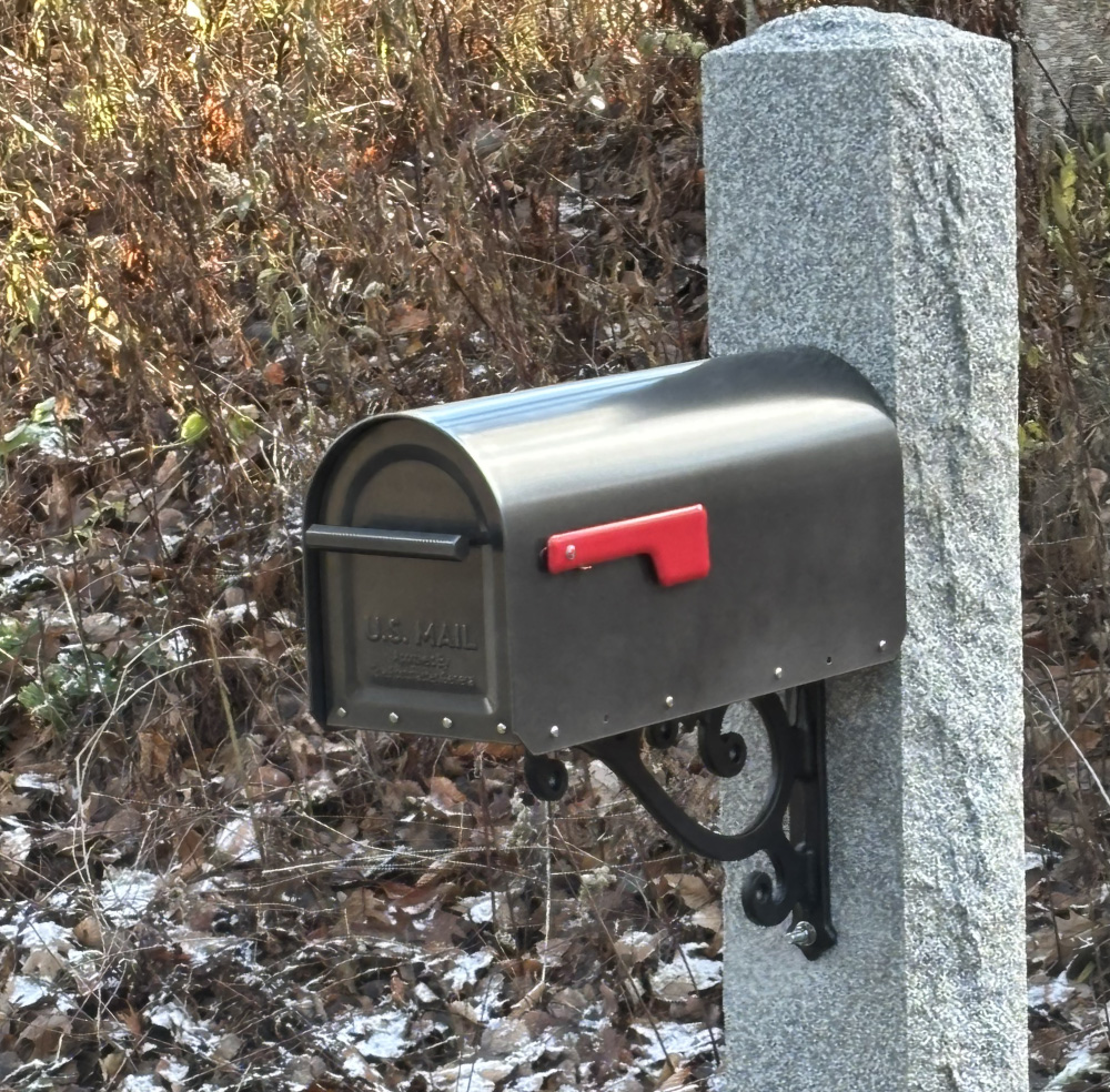 A single Mailbox on a post